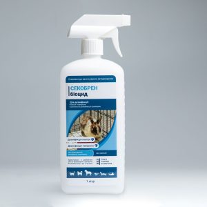 A 1-liter spray bottle of Biocide SECOBREN, a multi-purpose disinfectant for air and surfaces, with a label featuring a pet rabbit to show its safety for animals.